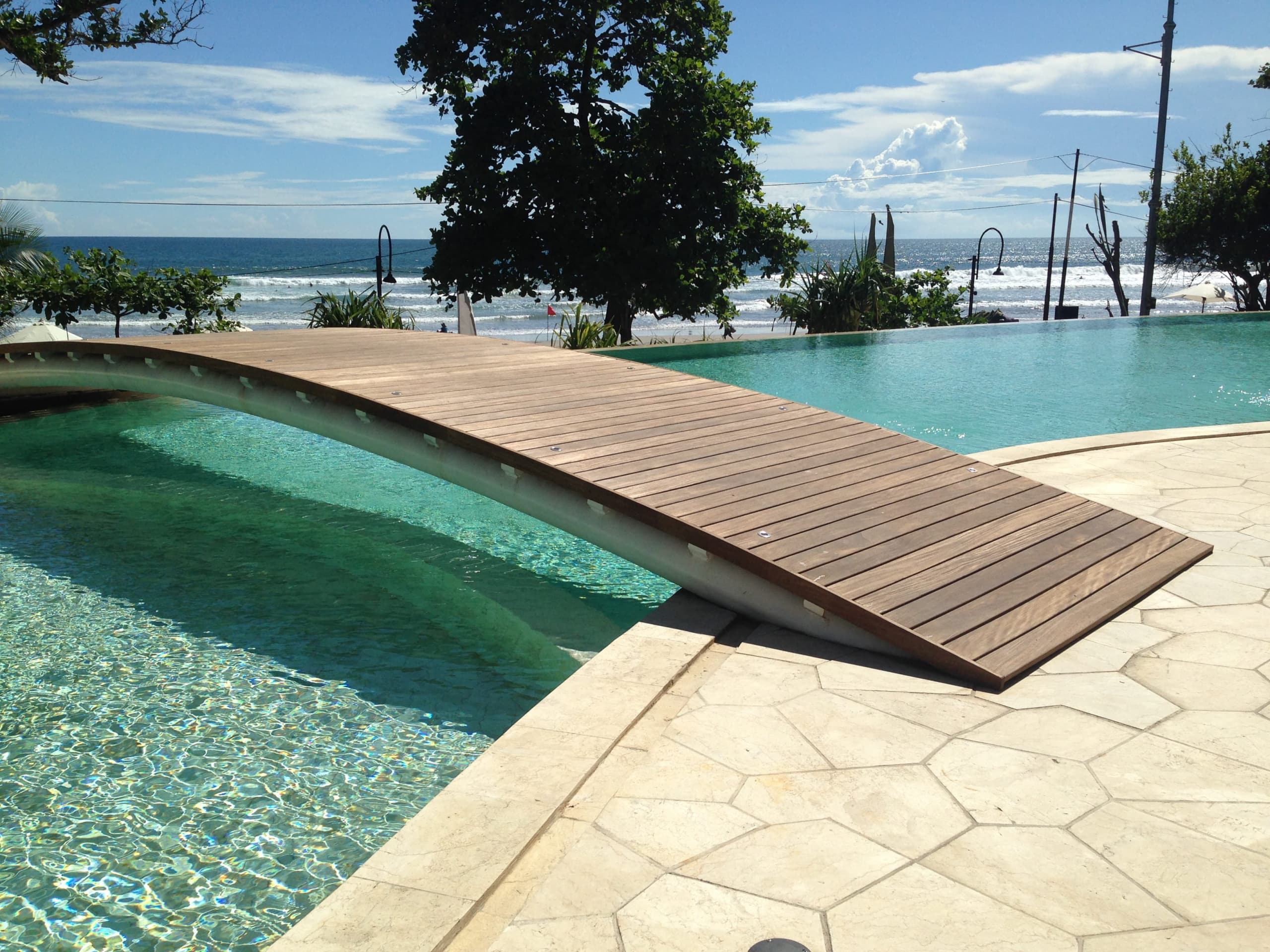 Beautiful wood bridge in ipe by Vetedy using softline decking system located in bali Indonesia