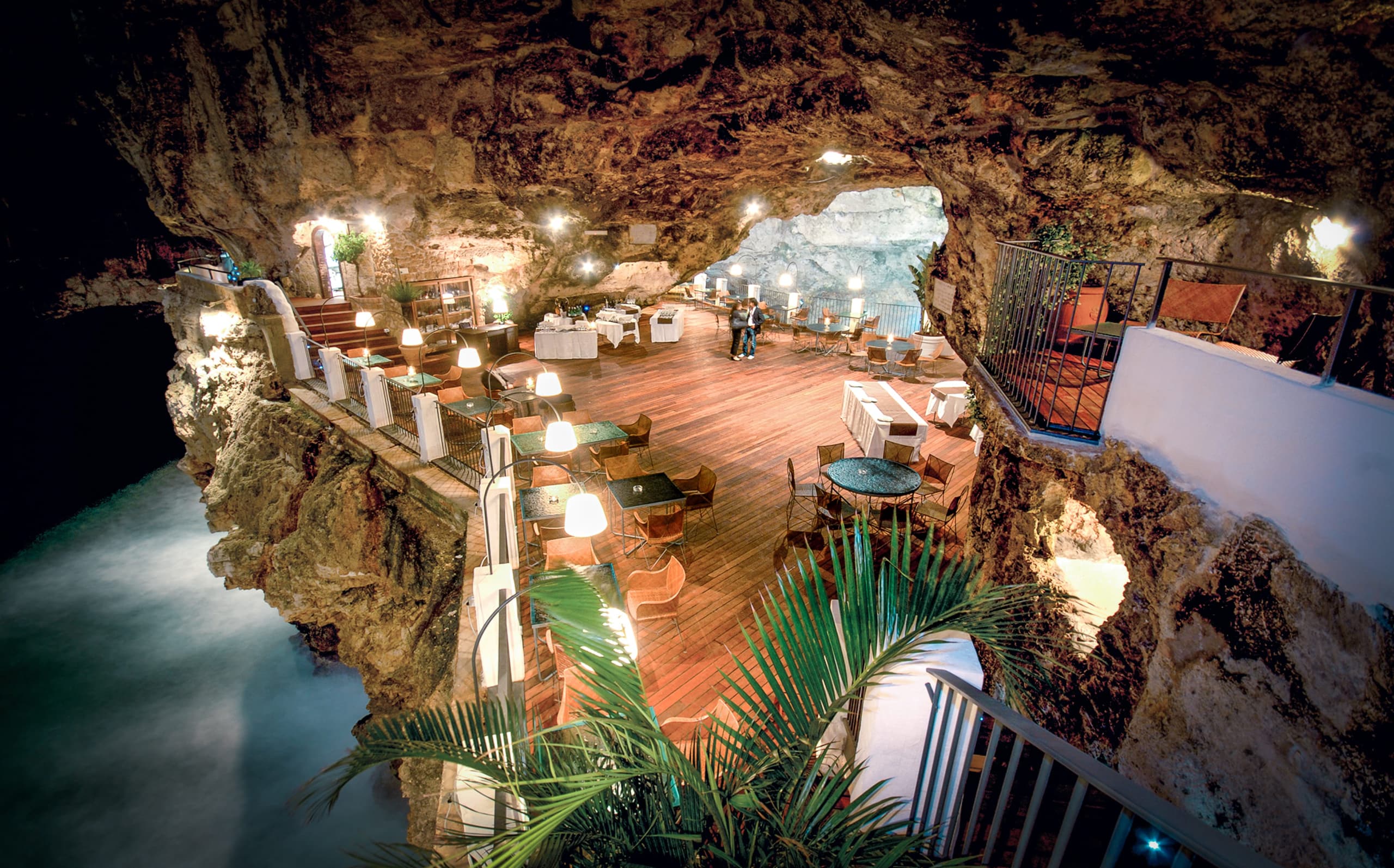 Incredible Restaurant Hostel Grotta Palazzese in Bari Italy next to the see luxury romatic restaurant with softline merbau shipdeck joint decking wood system